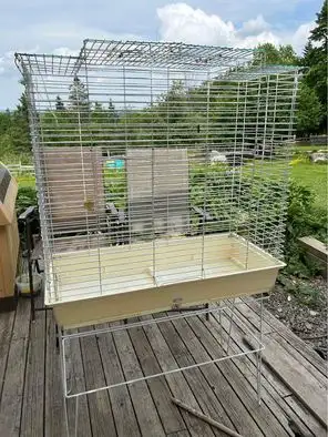 Bird flight cage for sale with stand. Lots of door access and pull out tray for easy cleaning. Comes...
