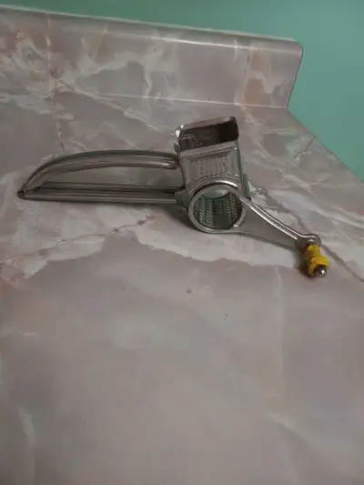 Antique Metal hand held cheese grater, View more