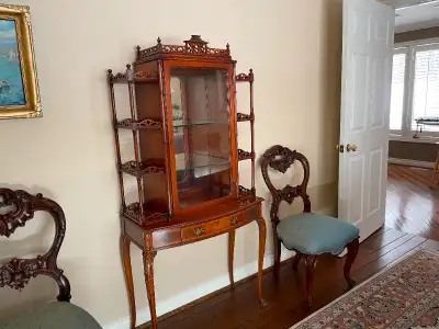 Antique Chinese Chippendale Mahogany curio cabinet with two interior glass shelves and exterior deco...