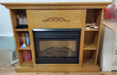 Fire place in good condition. Works and looks very good. If the ad is up the item is still available...