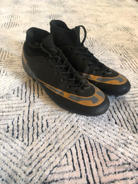 Black and gold soccer shoes size 9