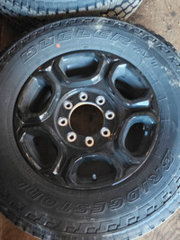 4 Ford 250 rims and tires LT 275/70R18 year 2023