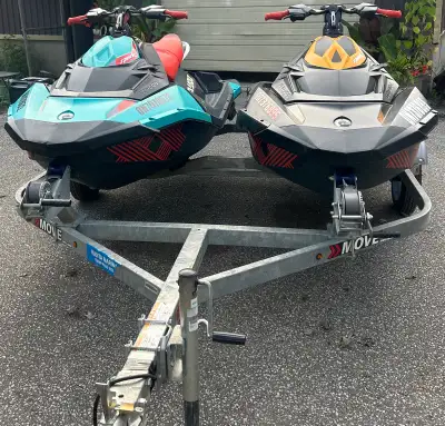 2 2018 Sea-Doo Spark Trixx jet skis, offering a thrilling on-water experience! These PWCs are in use...