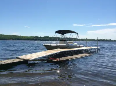 Fish hawk by Bombardier 90 hp evinrude . Moves out fast planes quickly. Trolls right down . 4 way sw...