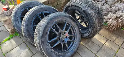 For sale continental winter tire 305/60/16 on gloss black rims 16x7.0 + black bolts for mazda3 only...
