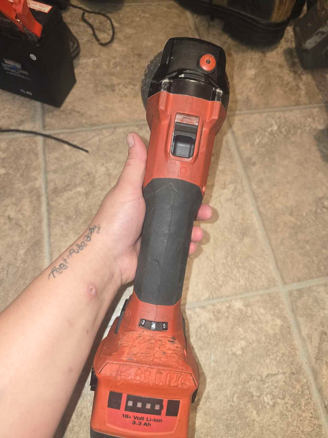 HILTI AG -A22 angle grinder  plus 2 batteries 18v in Power Tools in Saskatoon - Image 2