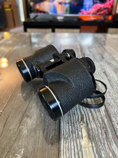 Vintage Bushnell Insta-Focus 7x35 binoculars, perfect for birdwatching or outdoor adventures. These...