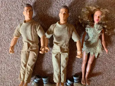 2 Mark Wahlberg Barbie dolls and the girl from the Planet of the Apes movie. $55. If just want one M...