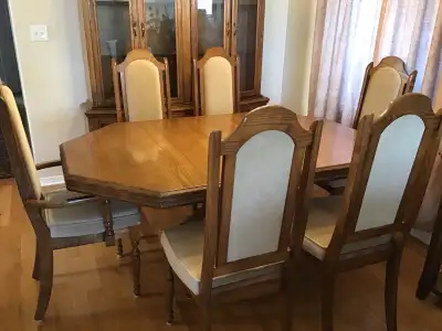 Dining room table, Buffet, Hutch and six chairs Excellent condition solid wood made in Canada 44 inc...