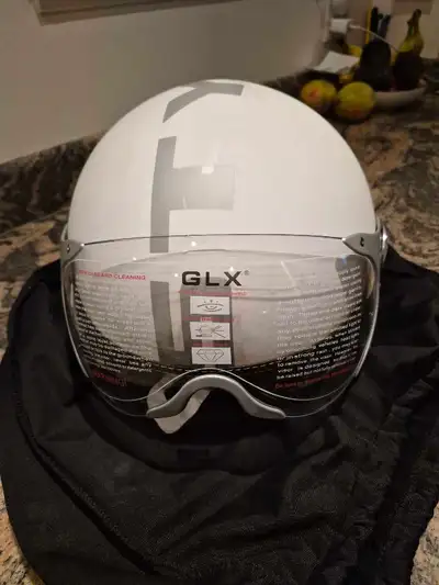 This is a new GLX open face 3/4 motorcycle helmet in white, featuring a dual visor and DOT approval...