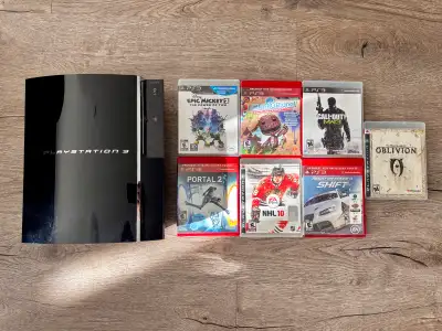 Rare PS3 60GB model CECHA01 (plays PS2/PS1 games) + 7 PS3 games, View more