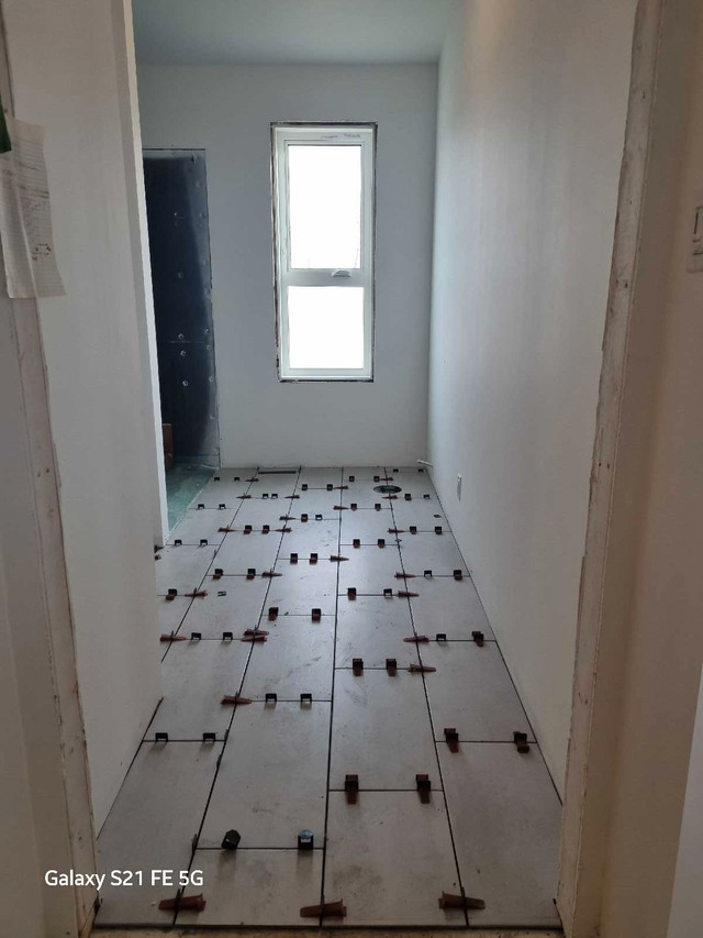 Installation of tiles and stone. in Flooring in Saskatoon - Image 4