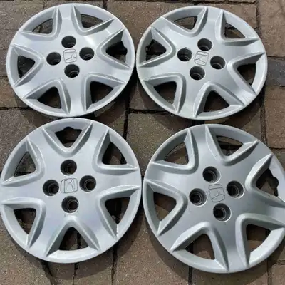 Clean matching set of Honda 15-inch wheel hubcaps, removed from a Civic with steel wheels. All clips...