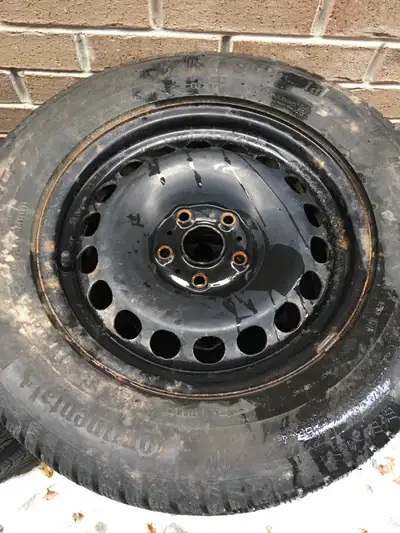 215/65/16 Continental Wintercontact Tires 5x112 OEM Volkswagen steel rims A set of winter wheels in...