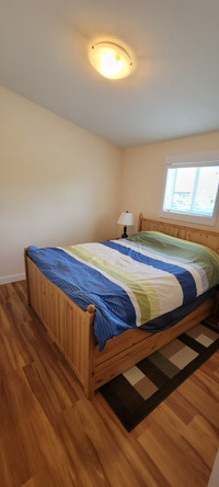 Master bedroom in fully furnished duplex close to OK College.