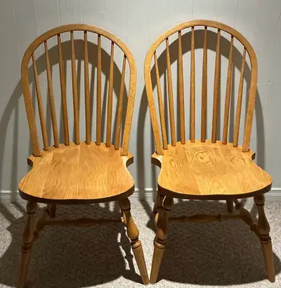 Two Solid Oak Windsor Dining Chairs, View more