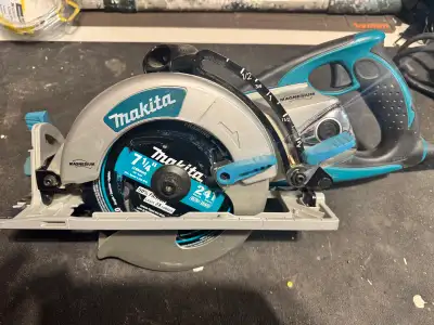 Makita 5377MG rear handle corded saw Only used for one project, in new condition. Magnesium table an...