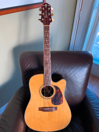 Crafter all solid wood acoustic electric Guitar.