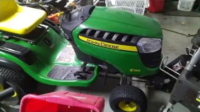 The John Deere E130 is a 2018 model 100 Series riding lawn tractor designed for residential properti...