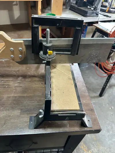 This is a used Stanley Mitre Box hand-powered miter saw for precise angle cuts. It's a reliable tool...