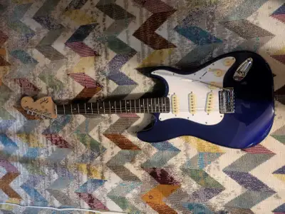 Mint purpley blue Squire Strat by fender, View more