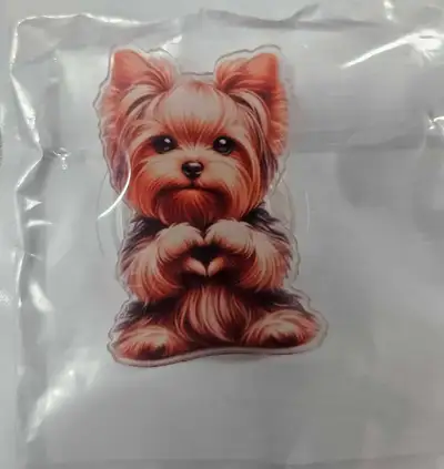 This is a brand new Yorkie Pop Socket. It will stick to the back of your phone, and can be used as a...