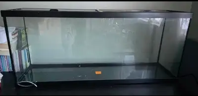 This is a large glass aquarium tank. (55 gallon) It's suitable for housing fish or other aquatic pet...