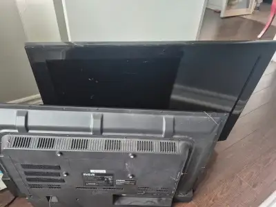 Two - 32 inch TVs, View more