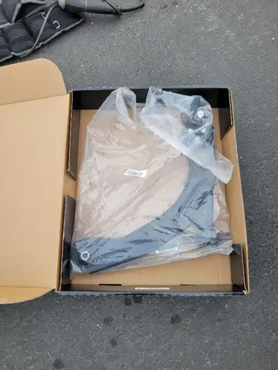 This is a new drivers side control arm still in its original packaging, ready to be installed and im...