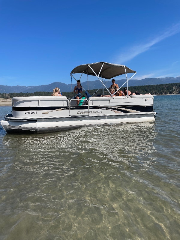 24 foot Pontoon Boat with new 115 evinrude motor Powerboats