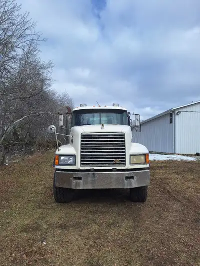 I am selling a used, but reliable picker truck, equipped with a crane for heavy lifting and flatbed...