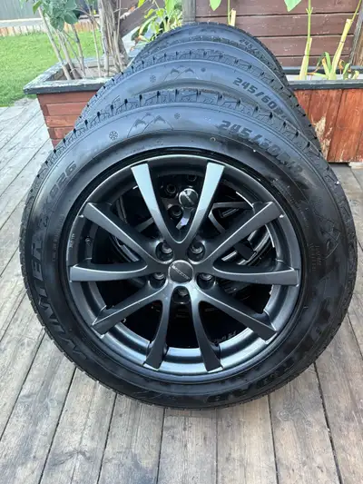 Almost new winter tires with original borbet alloy wheels 5x114.3 bolt pattern with sensors