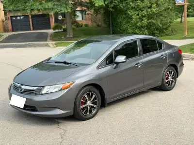 Selling my car! Honda Civic LX Year: 2012 Engine size: 1.8L / 4-cylinder, great fuel economy Km: 227...