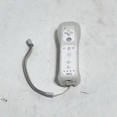 Get ready to level up your gaming experience with this Nintendo Wii Remote! This used controller is...