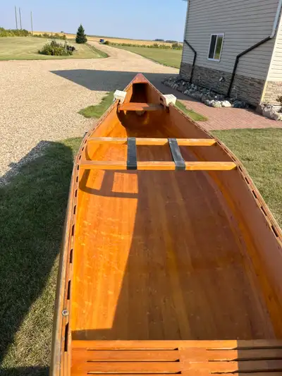 this canoe was hand built in quebec from white cedar it is 30 years old but has not seen water for l...