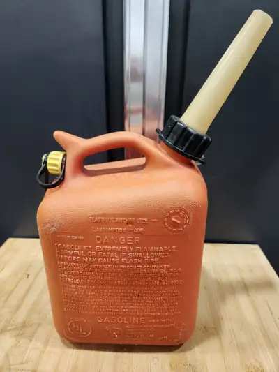 Two gas cans for sale. Each are 4.5 litres capacity. The red 4.5L does not have a spout, the other d...