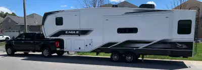 Spacious Jayco Eagle HT 30CRT fifth wheel with 3 slide-outs. The interior has a rear living area wit...