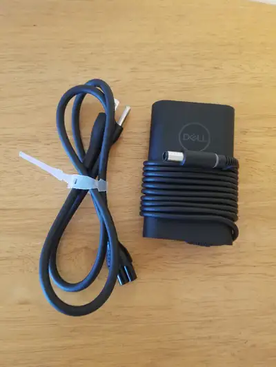 Dell adapter 65W Model HA65NM130 If you see my ad it's available. All ads get removed once sold imme...