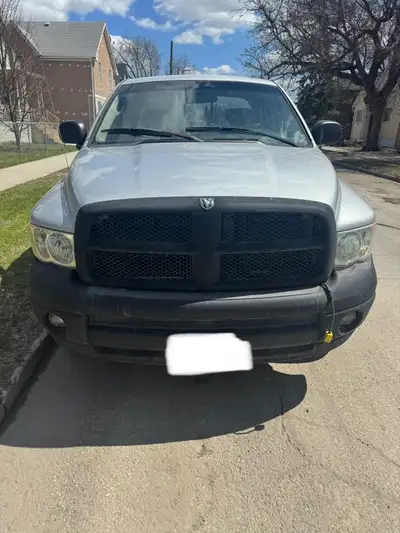 2004 Dodge Ram 1500 SLT Quad Cab 4x4. 5.7 HEMI ( runs great, no ticks ) AT. Good strong power train,...