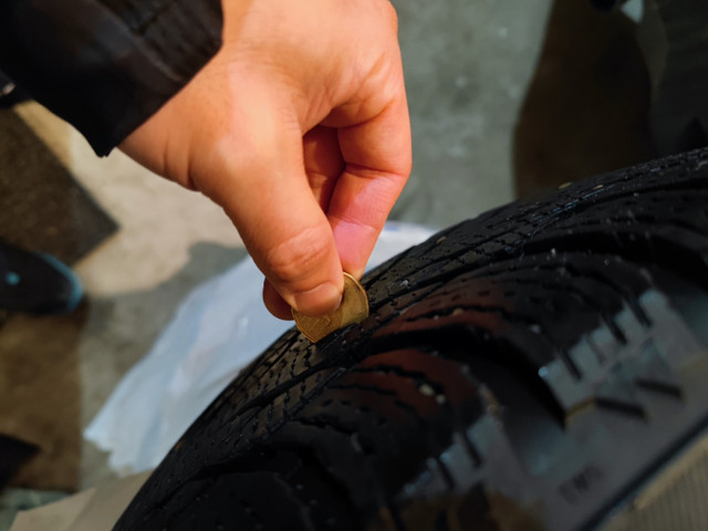 Nokian Hakkapeliitta R3 winter tires on rims with rim covers in Tires & Rims in Calgary - Image 2