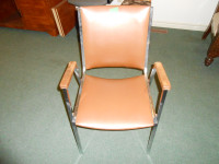Brown vinyl chair with metal legs