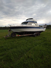 Boat and trailer for sale.