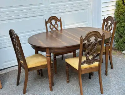 Dining Table with Extension Leaf and 4 Chairs. $150. , View more