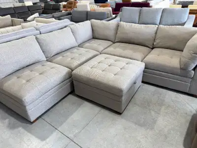 Demo six piece fabric sectional with storage ottoman, View more