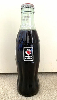 Coca Cola Bottle USA 1996 Dare to Care Spread a Little Sunshine