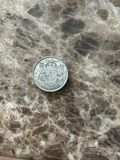 1943 Canadian 50 cent silver coin. , View more