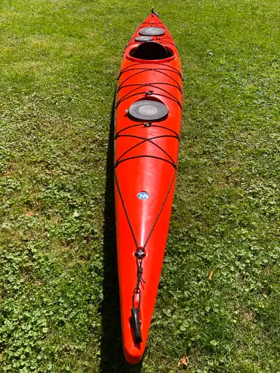 This is a 10+ year old WS Tsunami touring kayak, 17.5 feet long, 24” wide and weighs 68 lbs. It has...