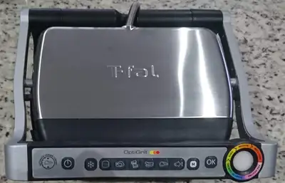 I am selling a T-FAL OptiGrill Grill with Automatic Sensor Cooking technology. - Features a powerful...