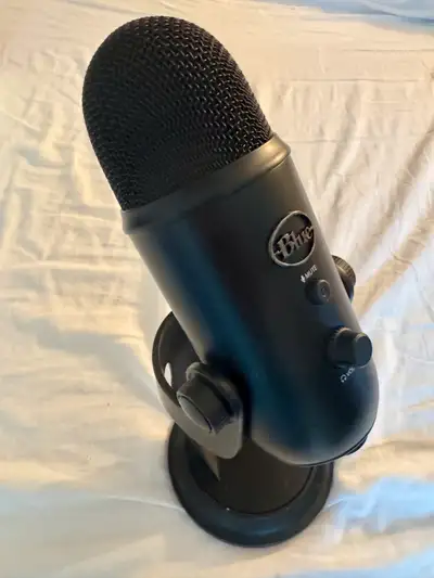 Great condition, comes with desktop mic stand and usb cable.