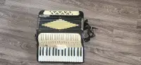 Old piano accordion.  Bass piano